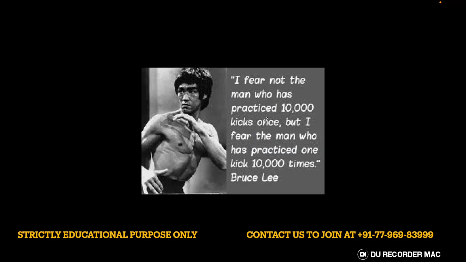 Bruce Lee poster shown during session to emphasize repetition and practice
